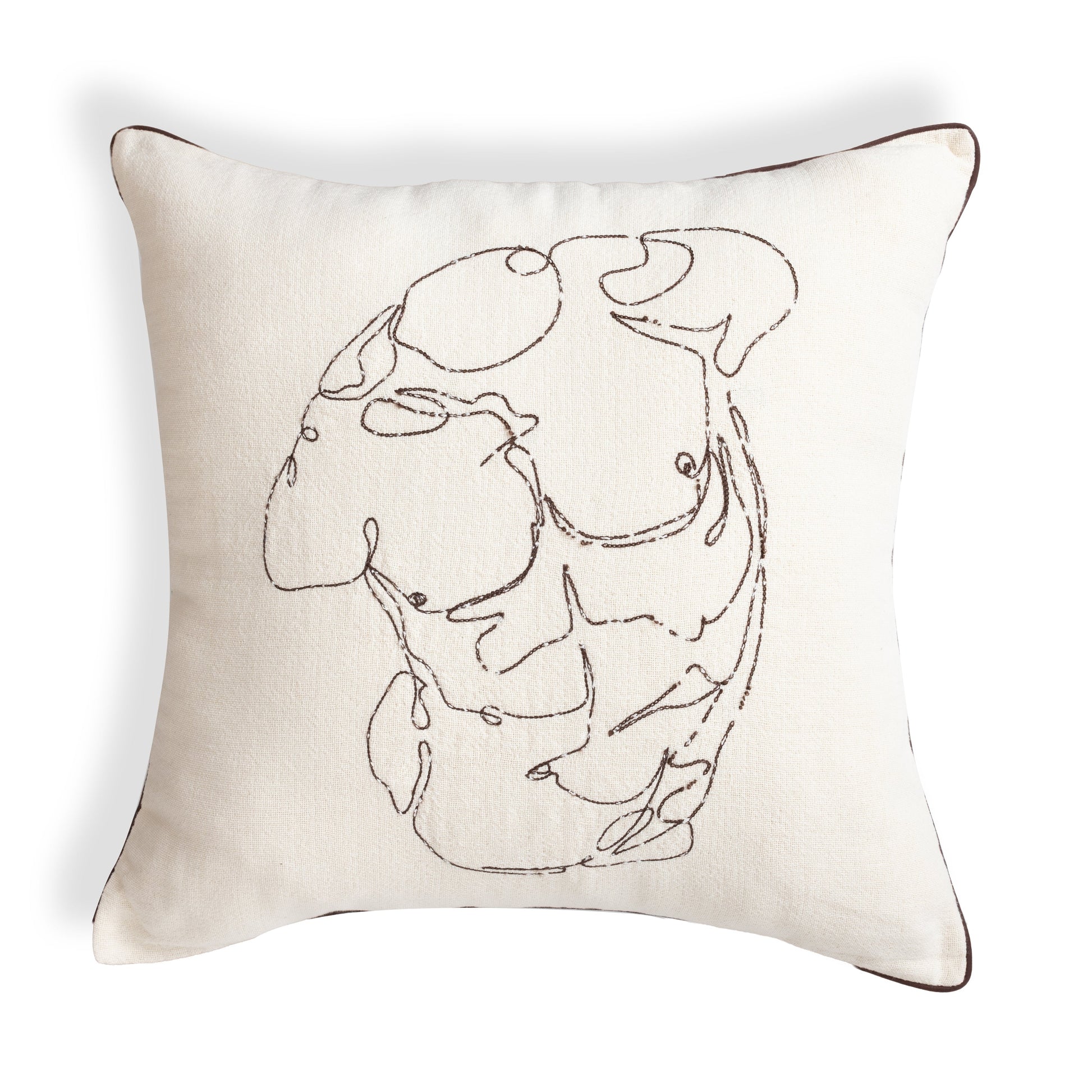 Decorative pillow with embroidered design on a white and beige background